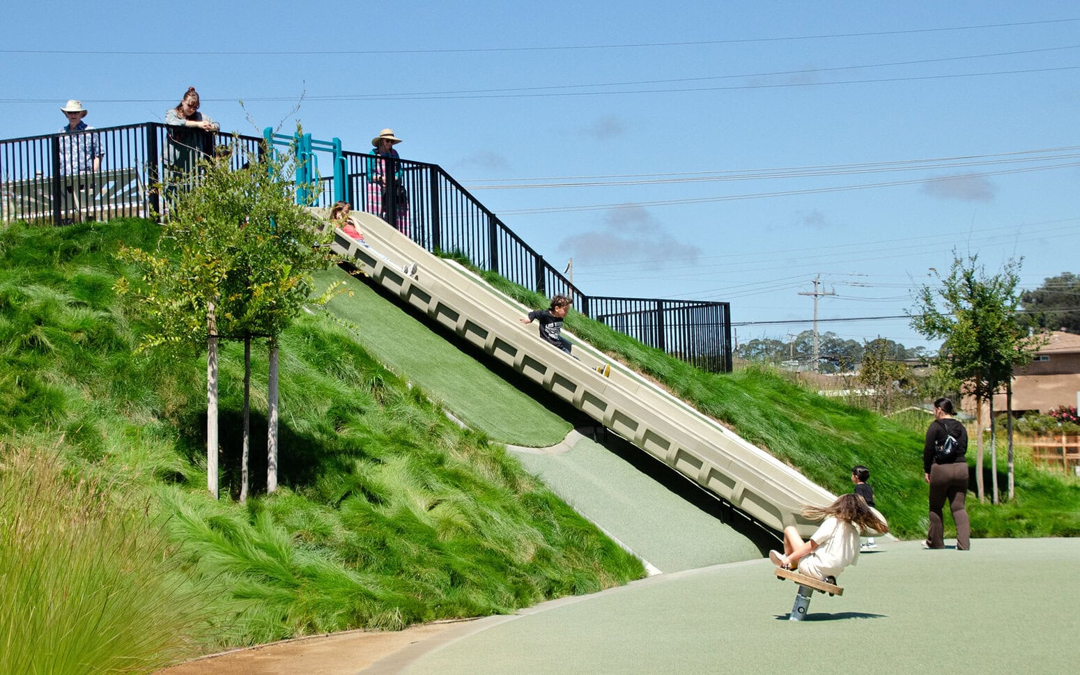 Children going down the slide.